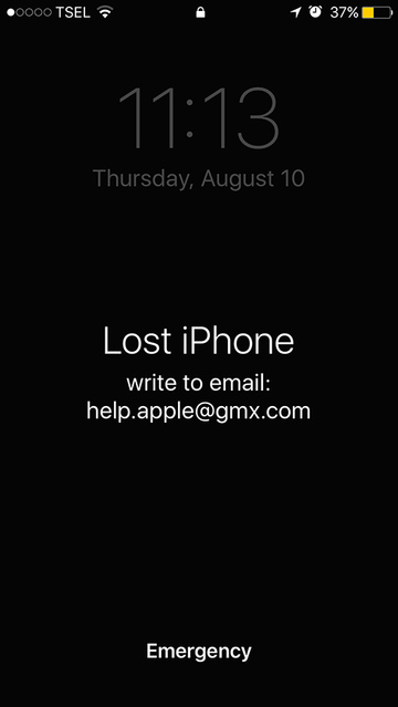 Lock screen message instructing a victim to contact help.apple@gmx.com